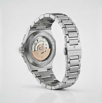 Back view of Casablancan Al-Riyadh Heritage 43mm Arabic Dial Watch showing automatic movement and engraved Arabic script on stainless steel case.