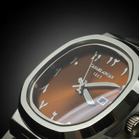 Casablancan arabic dial watch with brown dial and silver case on a dark background