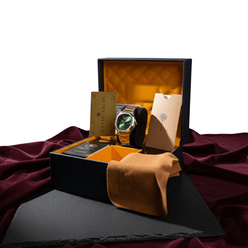 Casablancan Al-Riyadh Heritage 43mm Arabic Dial Watch with green sunray face, Khanjar hands, and stainless steel band in luxury gift box.