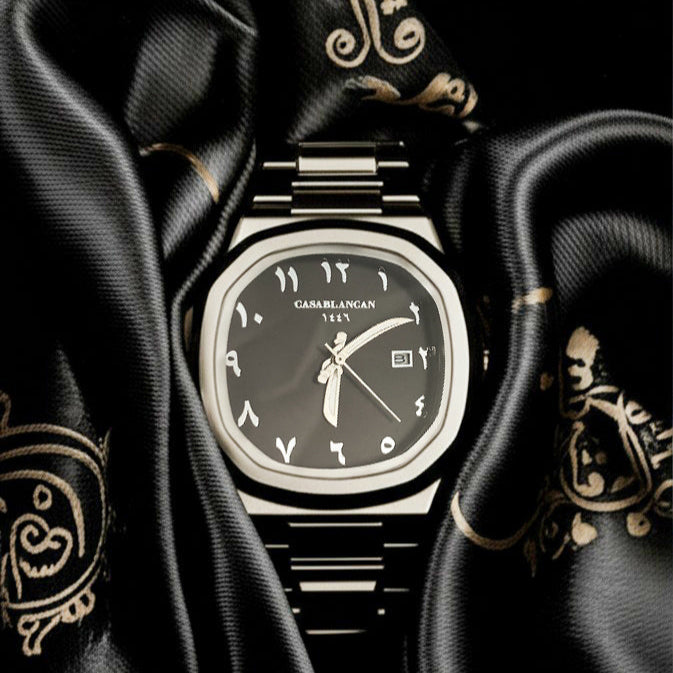 Luxury Casablancan Onyx Sentinel Arabic dial 43mm Watch intricate design on a black fabric background