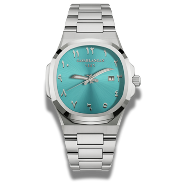 Casablancan Arabic dial Watch with turquoise dial and silver bracelet on a white background