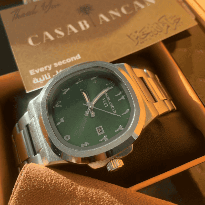 Green arabic watch with silver case in a brown box, featuring 'Casablancan' branding custumer review 