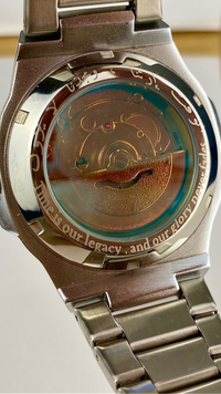 Close-up of Casablanca Arabic numerals watch with a detailed mechanical movement on a white background