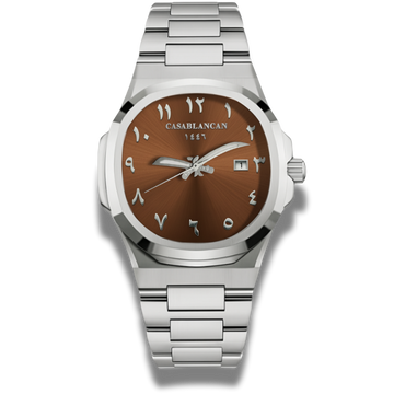 Casablancan watch with brown dial and silver metal strap on white background